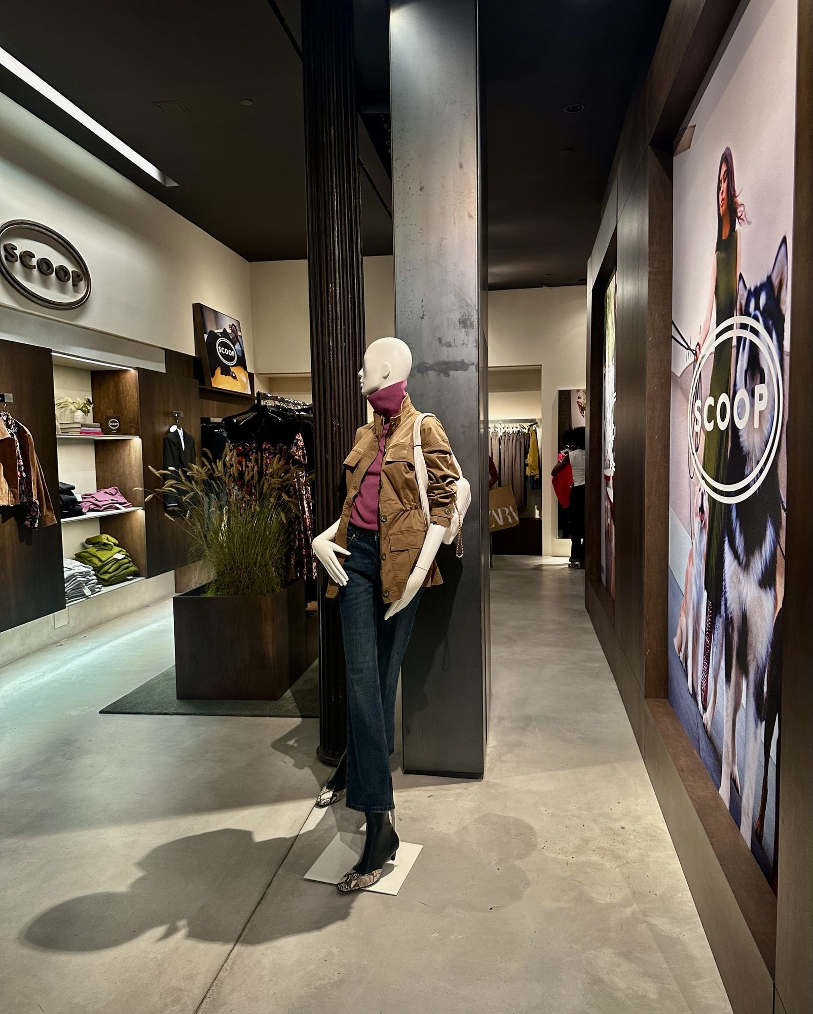 Scoop at Walmart’s SoHo pop-up: Scoop signage, a styled mannequin and large campaign imagery.